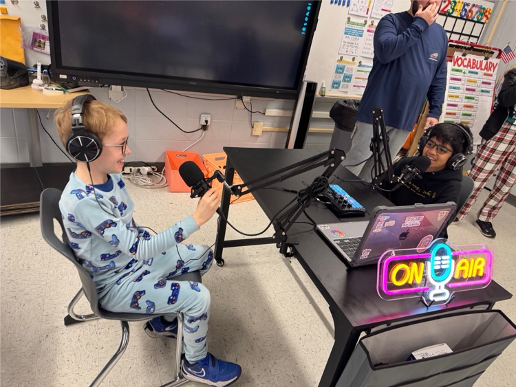 students recording themselves using new equipment 