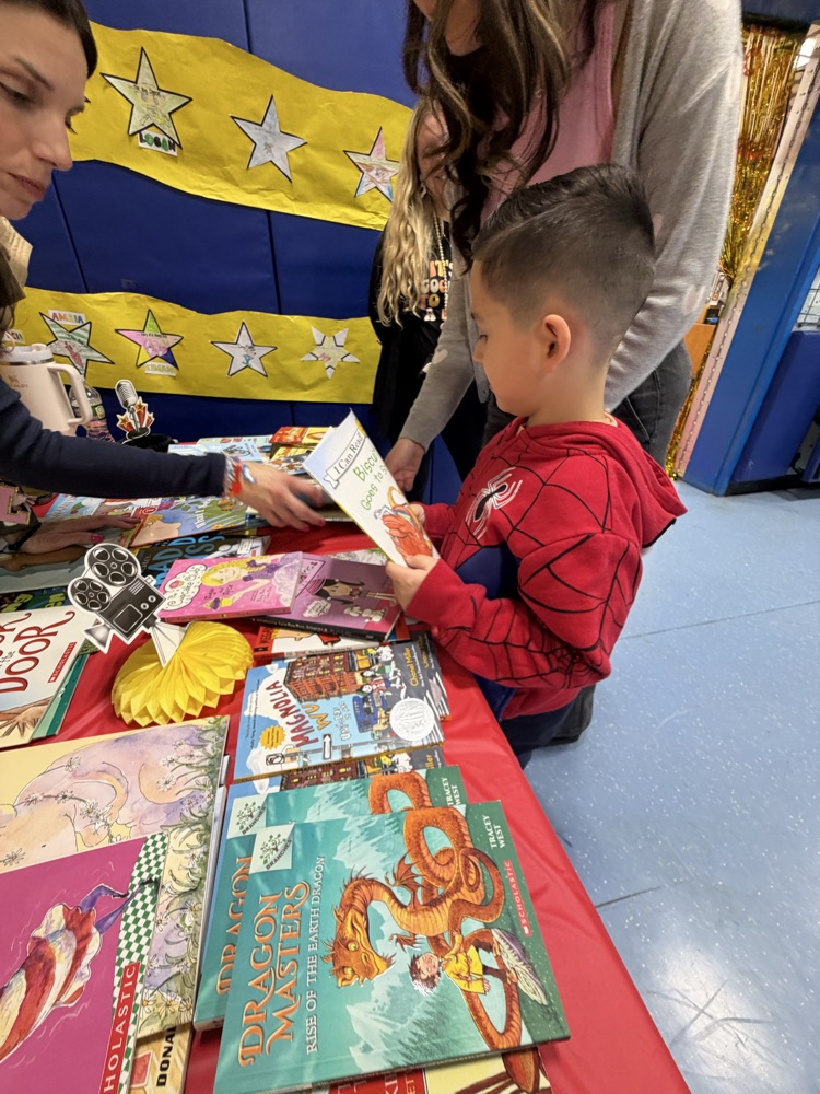 winner picking a book