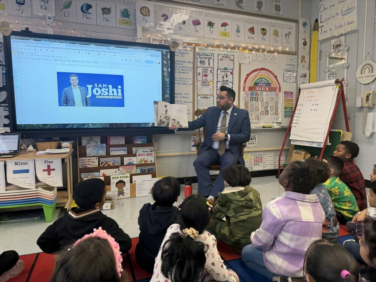 mayor Sam joshi reading to first grade