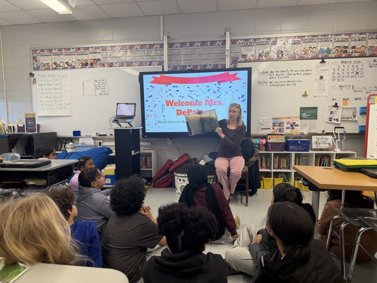 retired art teacher Mrs. Depalma reading to fifth grade