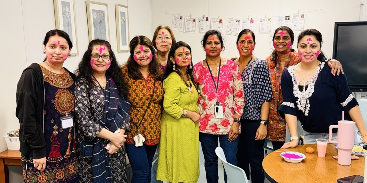 women dressed in traditional Indian apparel 