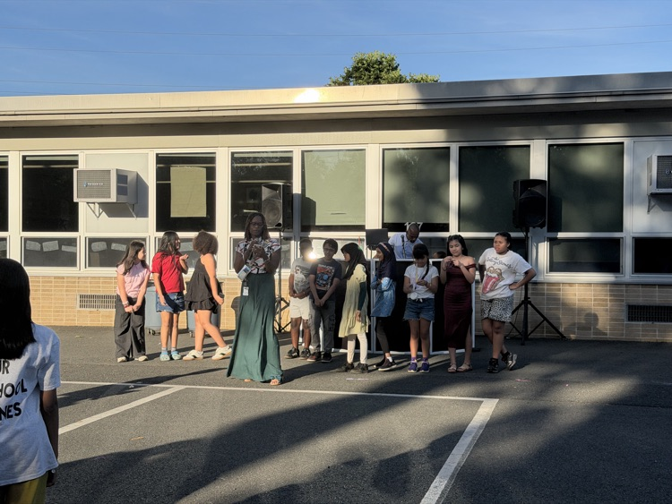 fifth graders and their families enjoying the social