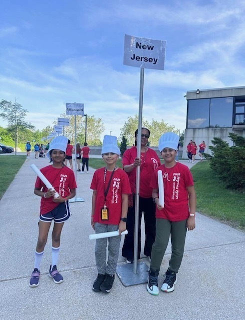SOM Photos- Students at competition wearing red OM shirts