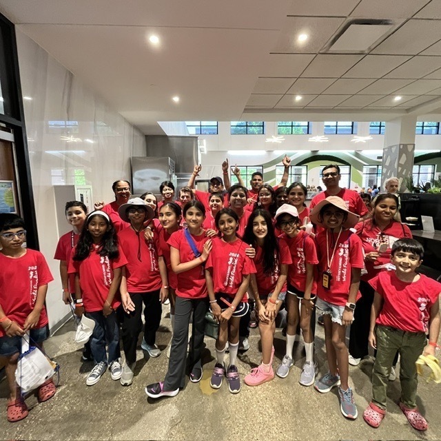 SOM Photos- Students at competition wearing red OM shirts