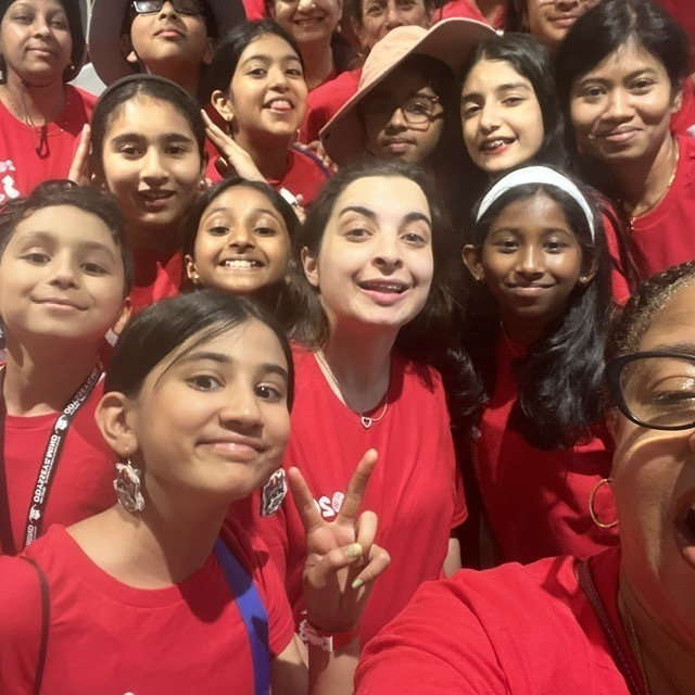 SOM Photos- Students at competition wearing red OM shirts