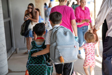 kids outside school on first day of school