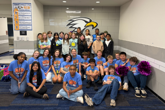 5th grade students pose with 8th grade WEB leaders at the conclusion of their 5th grade visit. 
