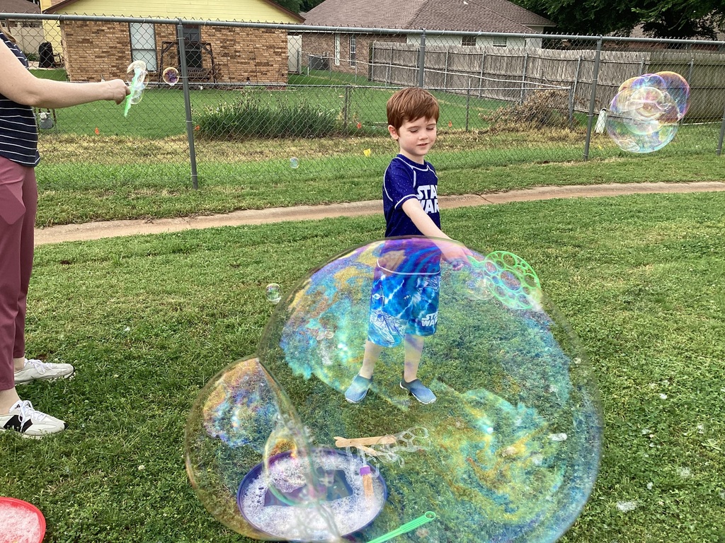 A child blowing bubbles