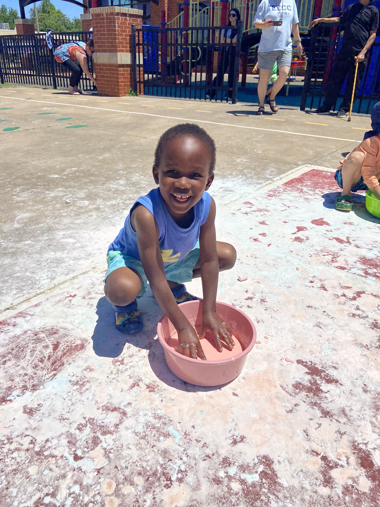 A student playing in goop