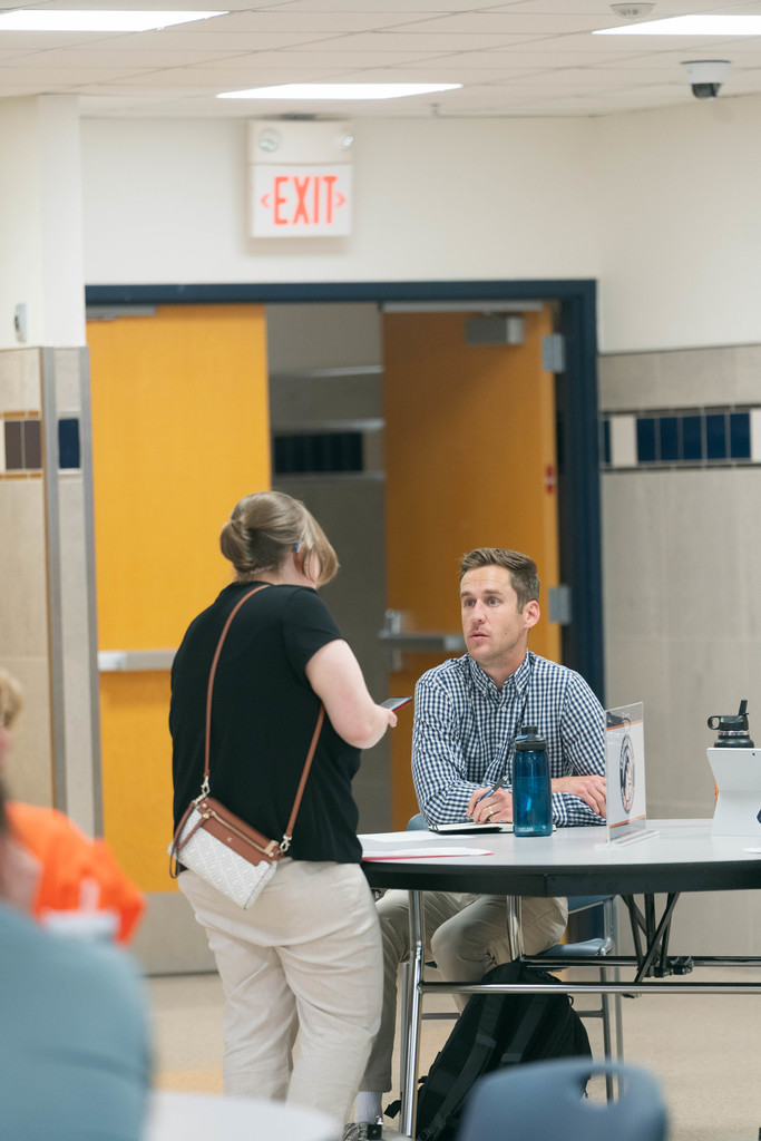 people talking during a career fair
