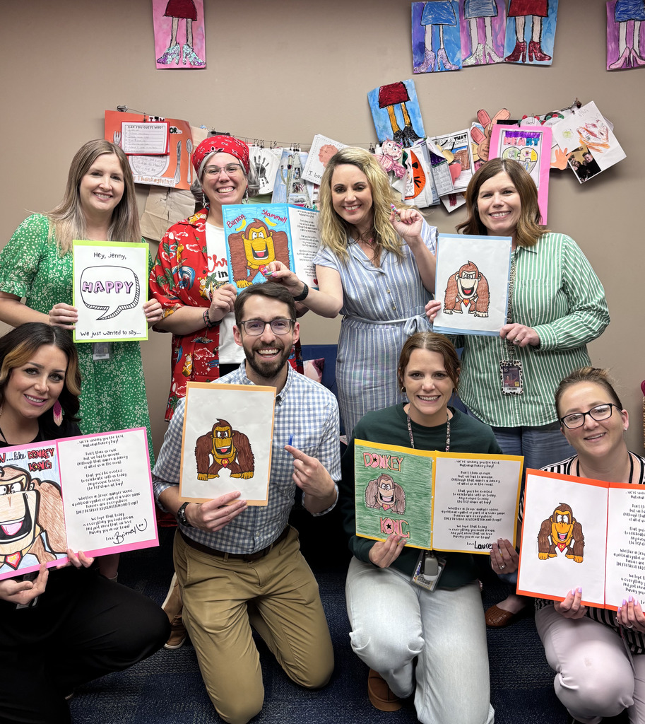 office staff with cards they made for mrs williams 
