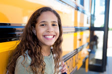 girl by bus