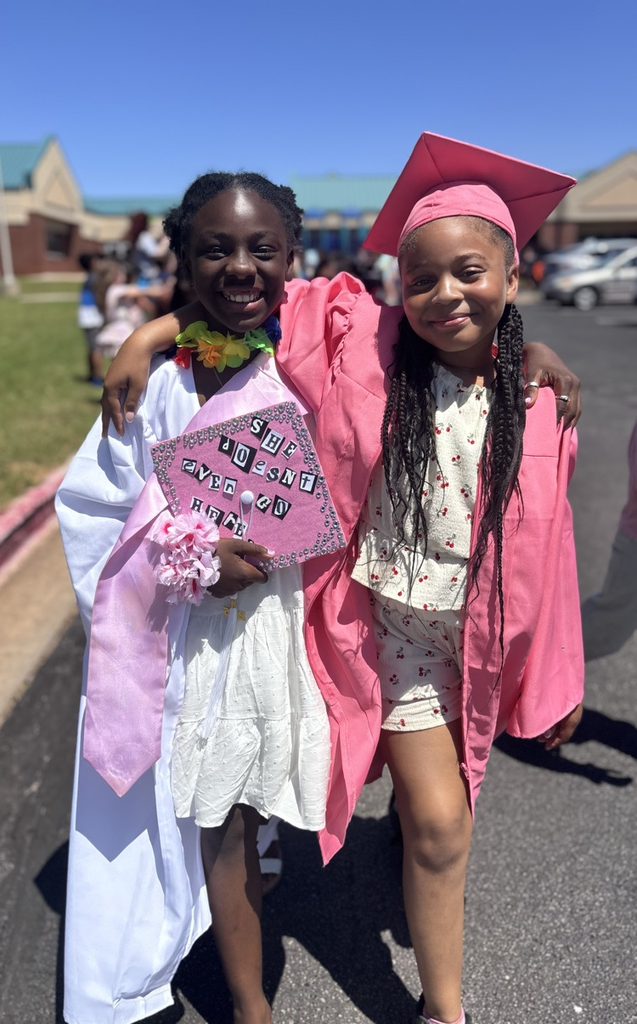 fifth grade friends during graduation clap out 