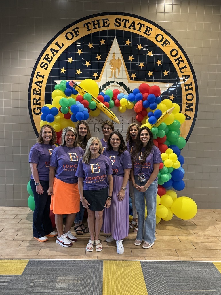 teachers in purple t shirts 