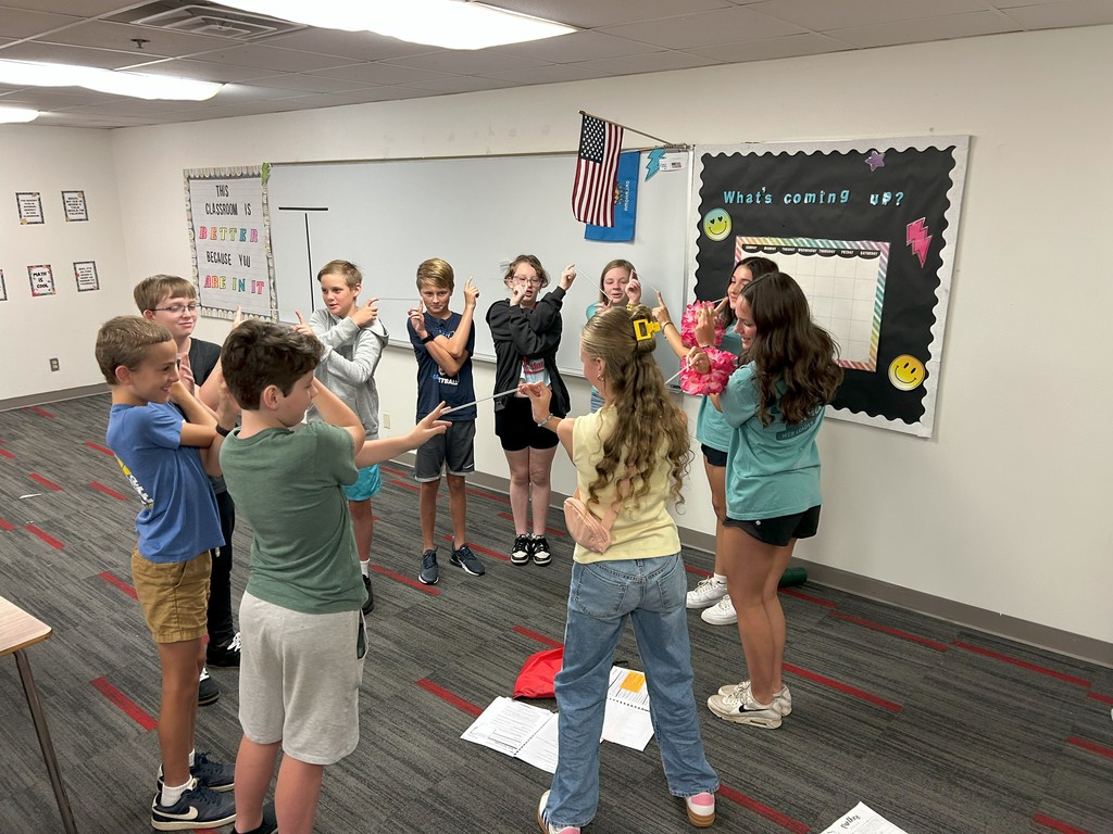 students doing an activity in a circle