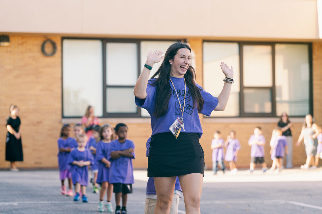 teacher waving