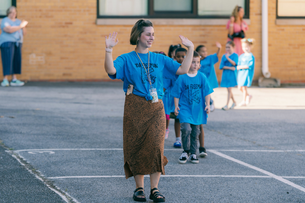teacher waving
