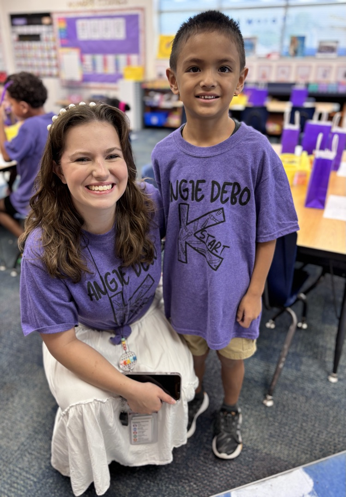 Miss Appleton and one of her purple team students 