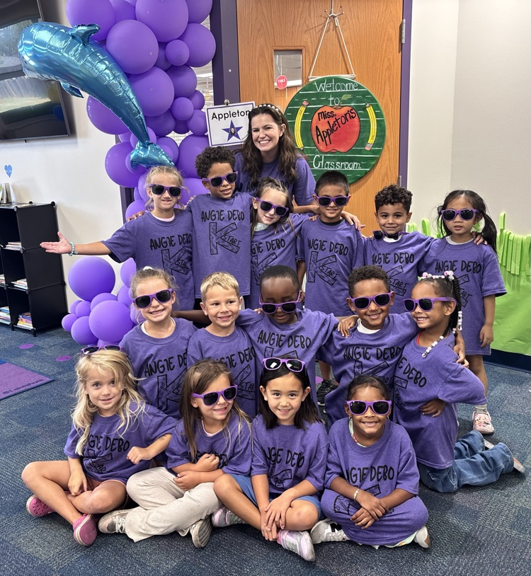 purple team with their teacher, Miss Appleton 