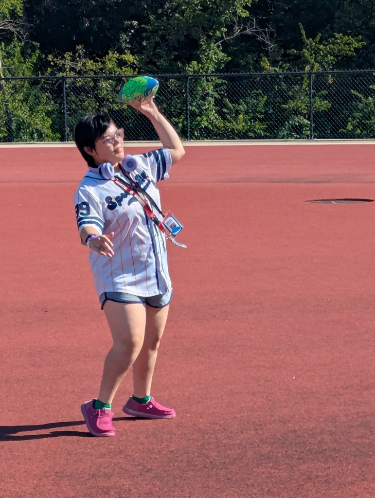 intern throwing a football