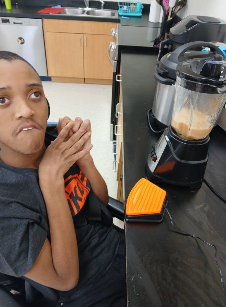 an intern using a blender