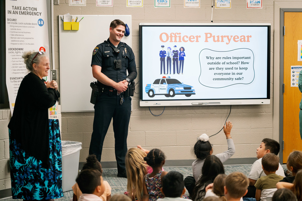 police officer talking to class