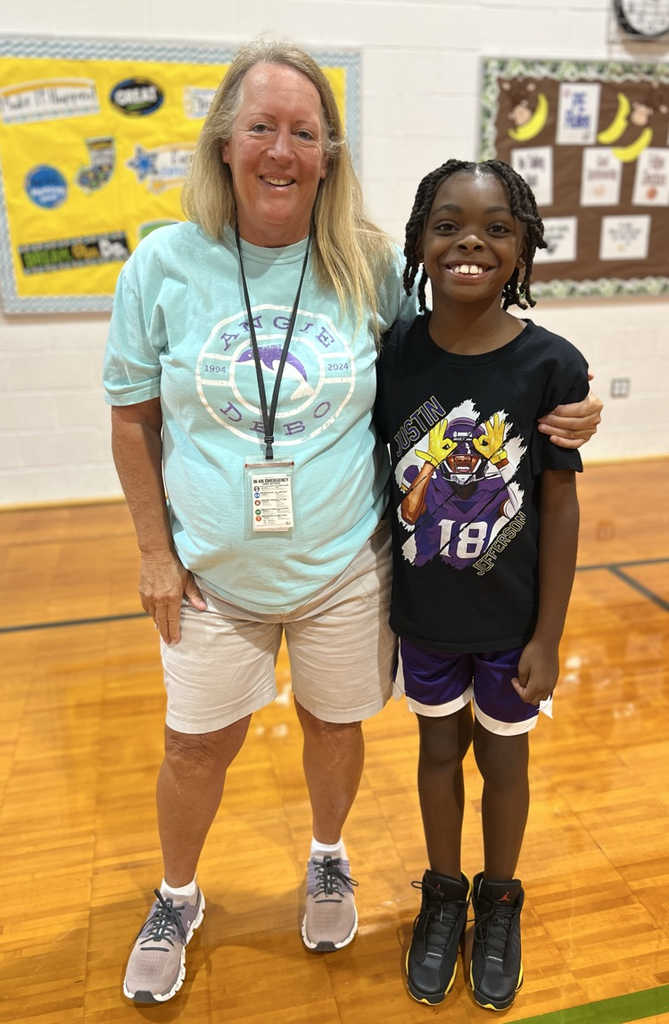 student and teacher celebrating the impossible shot