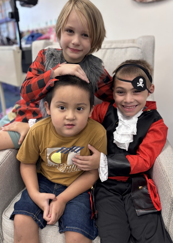 first grade students in Disney costumes 