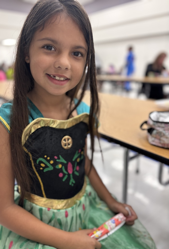 second grade student in princess dress