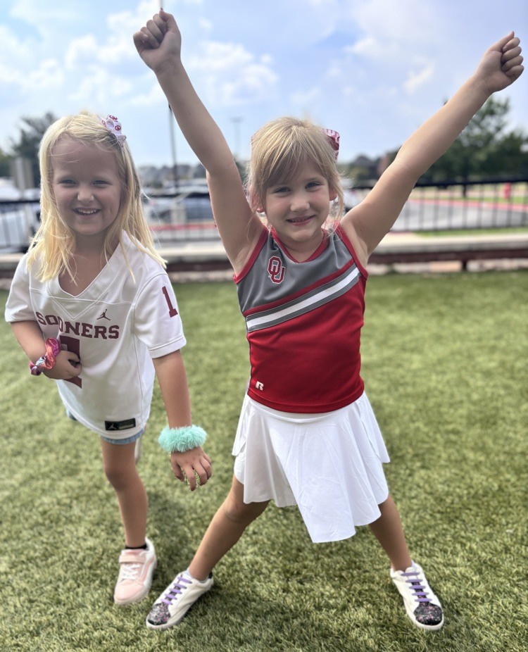 kindergarten football player and cheerleader 
