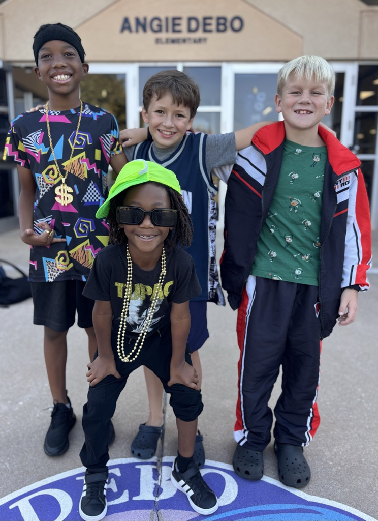 students dressed up in 90s gear 
