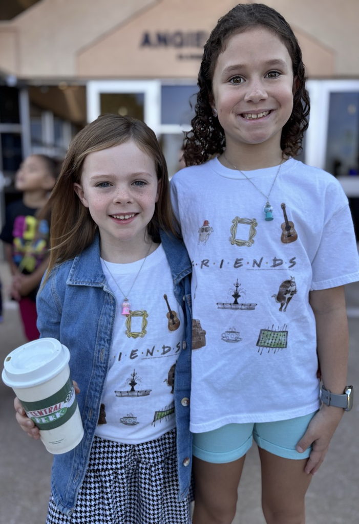 students dressed up in friends merch