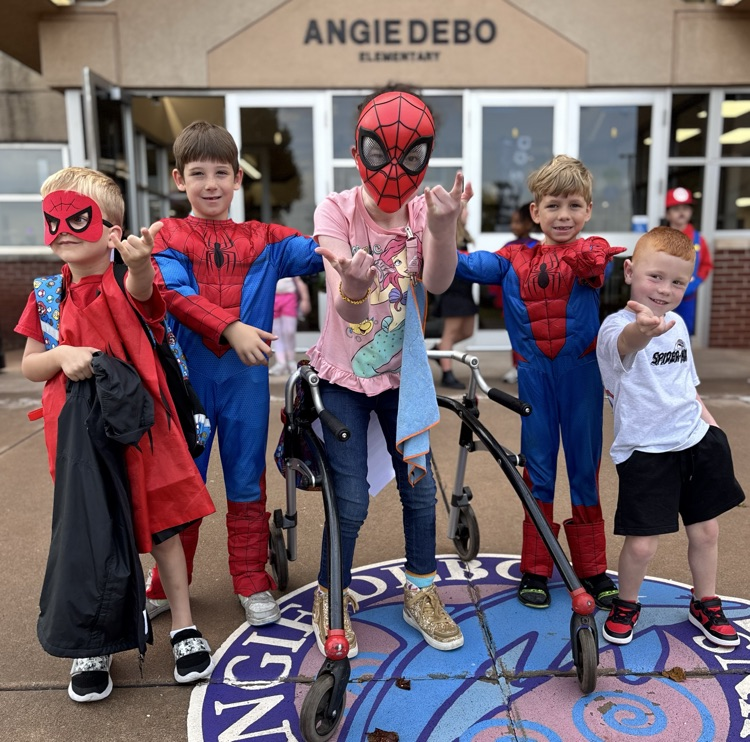 students dressed in Spider-Man attire 