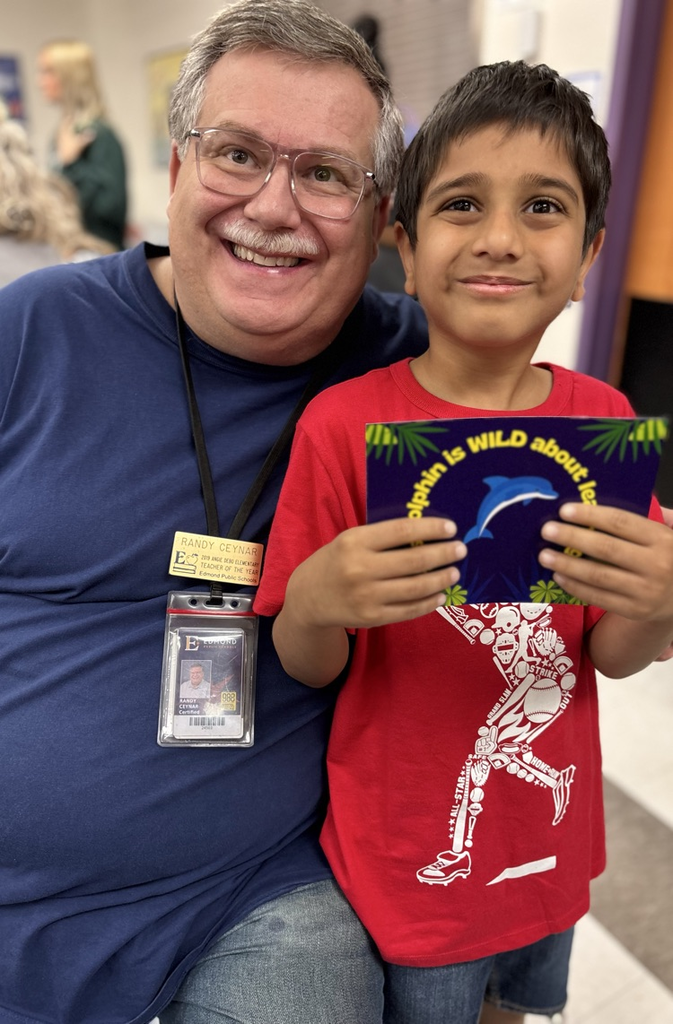 student with teacher and postcard 