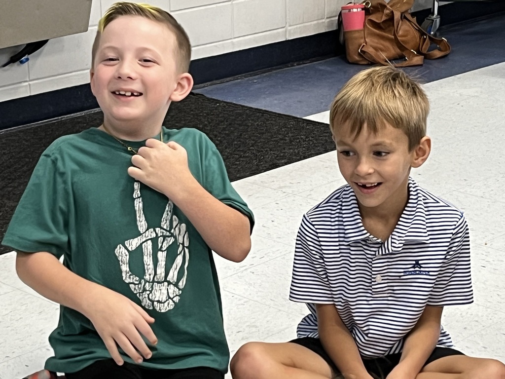 Second graders playing tadpole, tadpole, frog