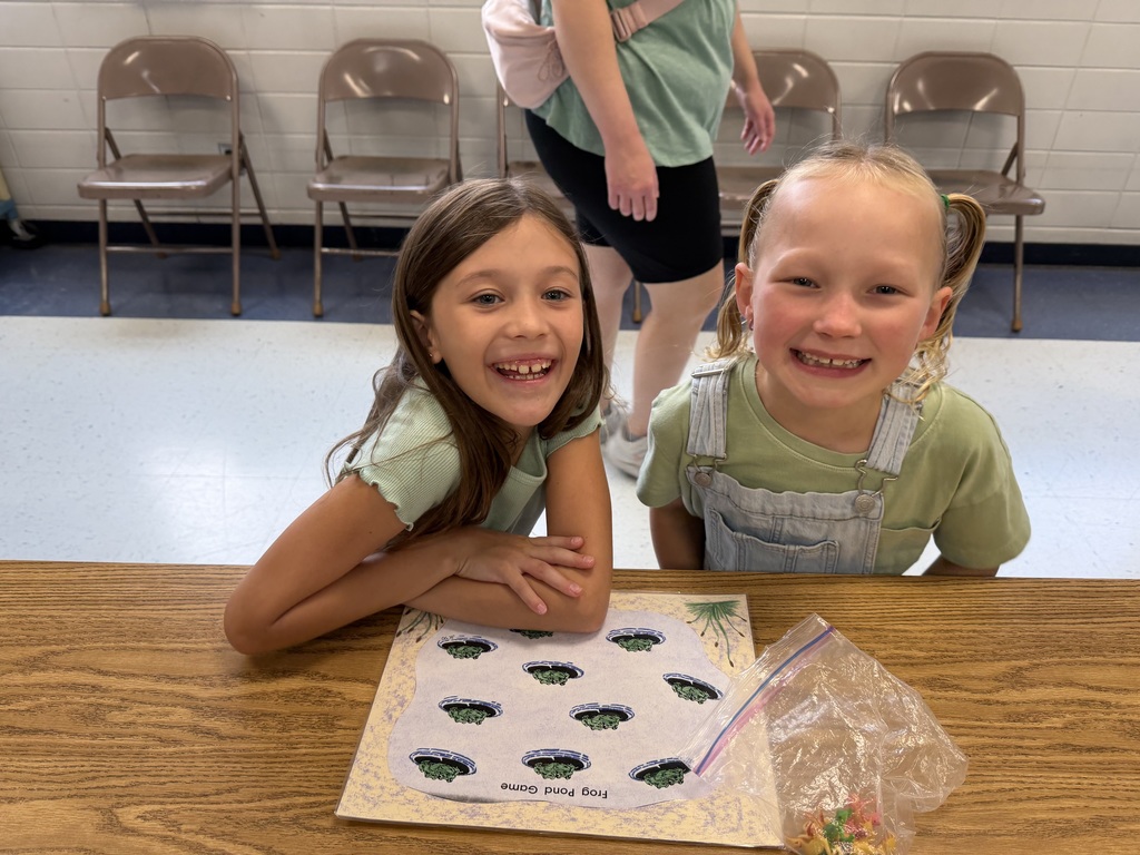 Second graders playing a frog game