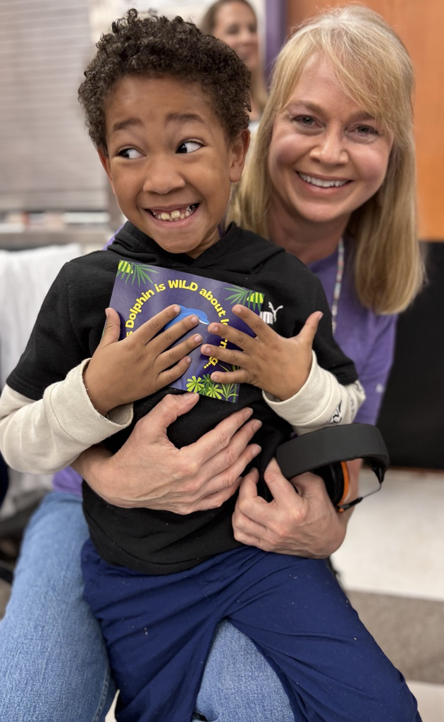 student receiving postcard from teacher 