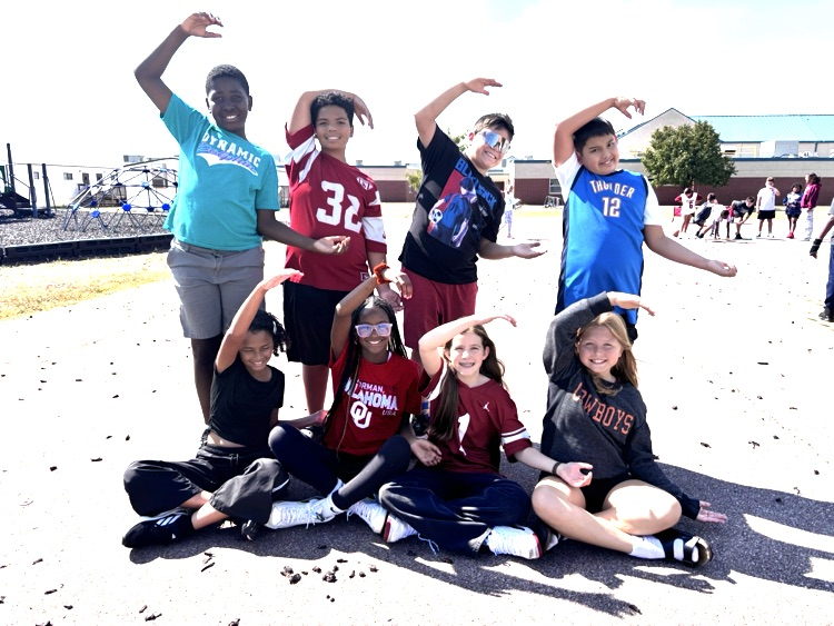 fifth grade students making the letter c