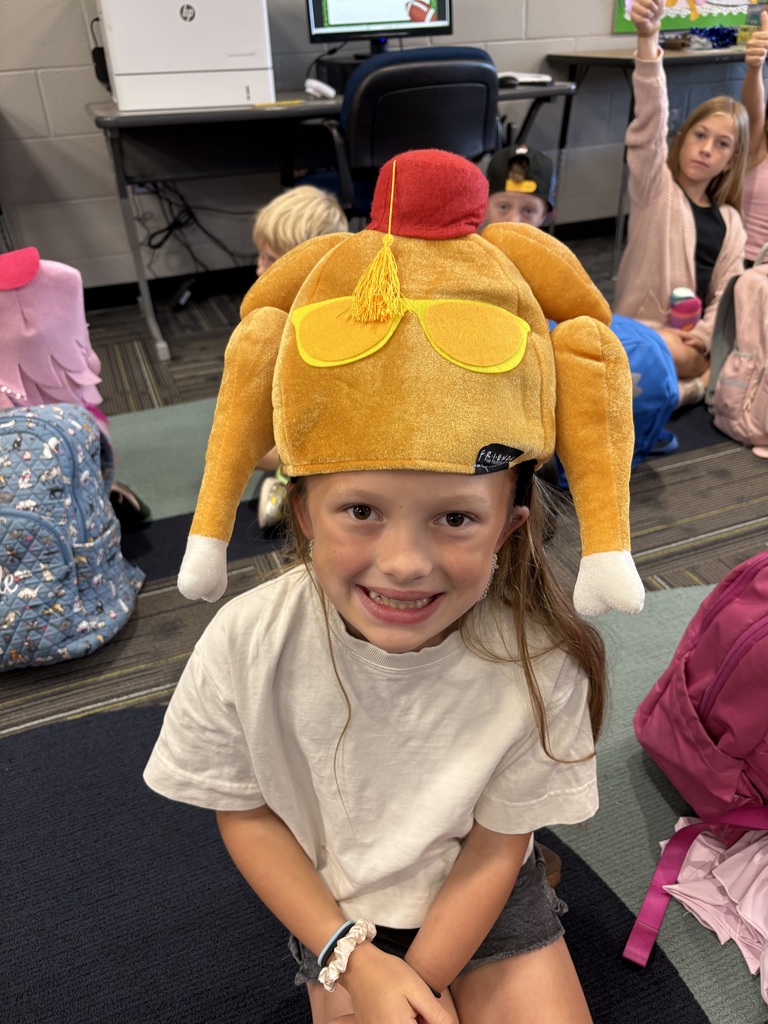 Student with turkey hat