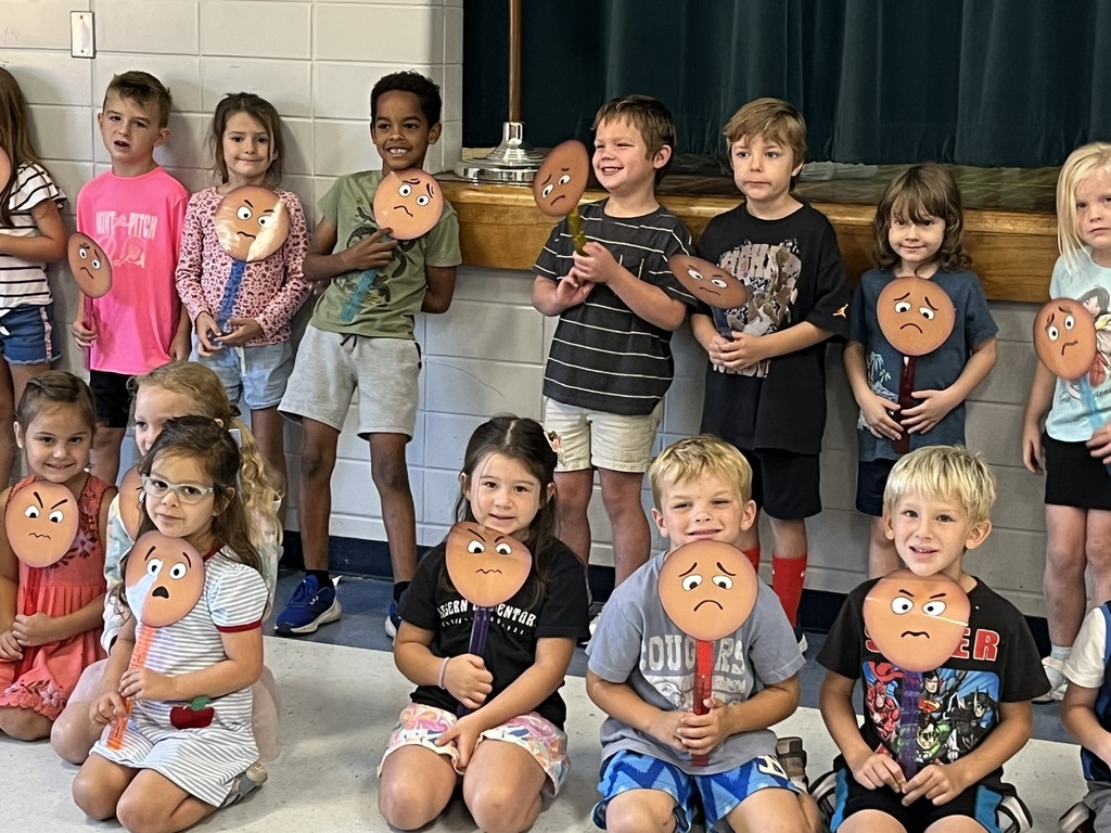 Clegern kindergarteners show their feeling buddy faces.