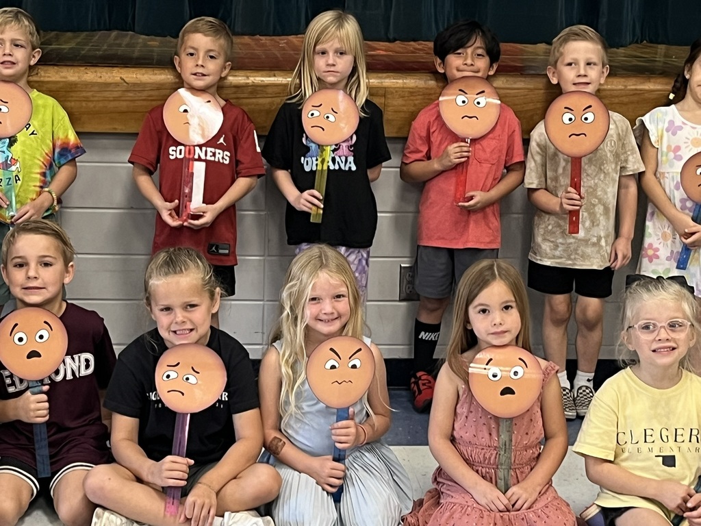Clegern kindergarteners show their feeling buddy faces.