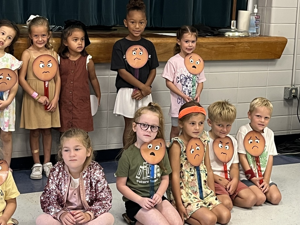Clegern kindergarteners show their feeling buddy faces.