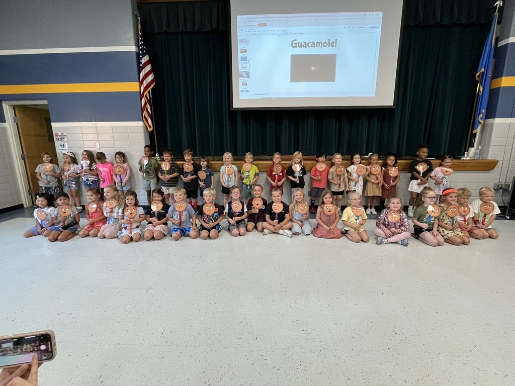 Clegern Kindergarteners show their feeling buddy faces.