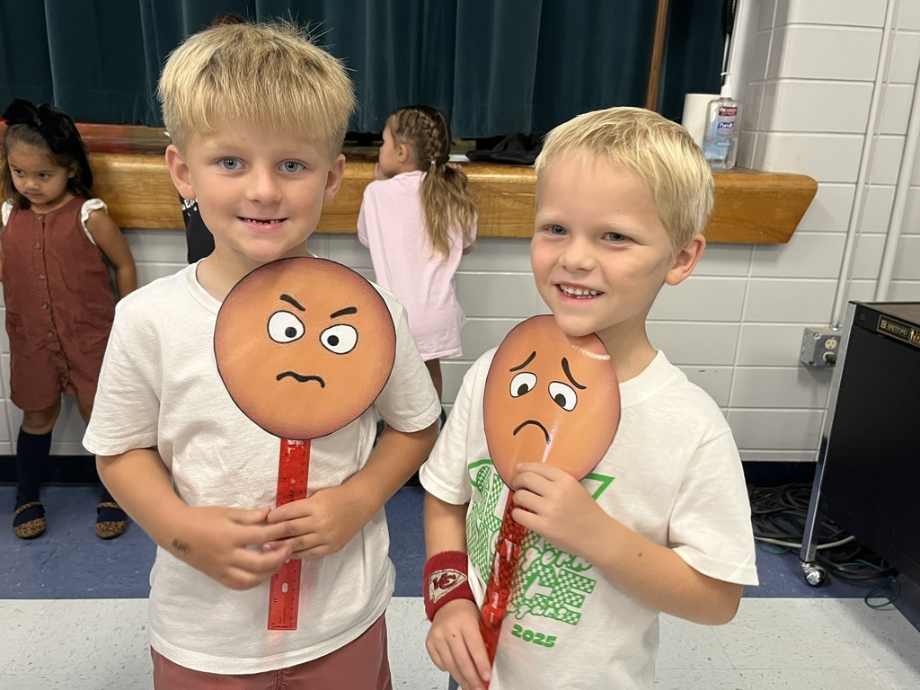 Clegern Kindergarten boys smile at the camera.
