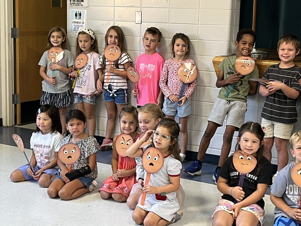 Clegern kindergarteners show their feeling buddy faces.