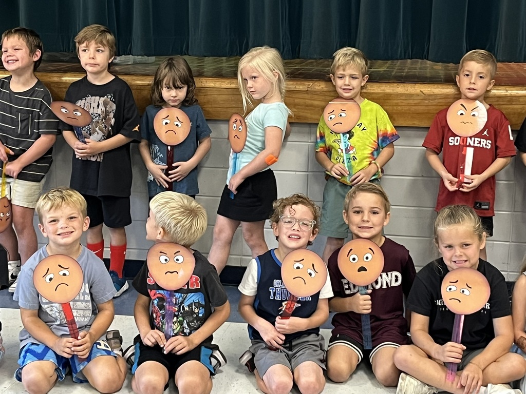 Clegern kindergarteners show their feeling buddy faces.