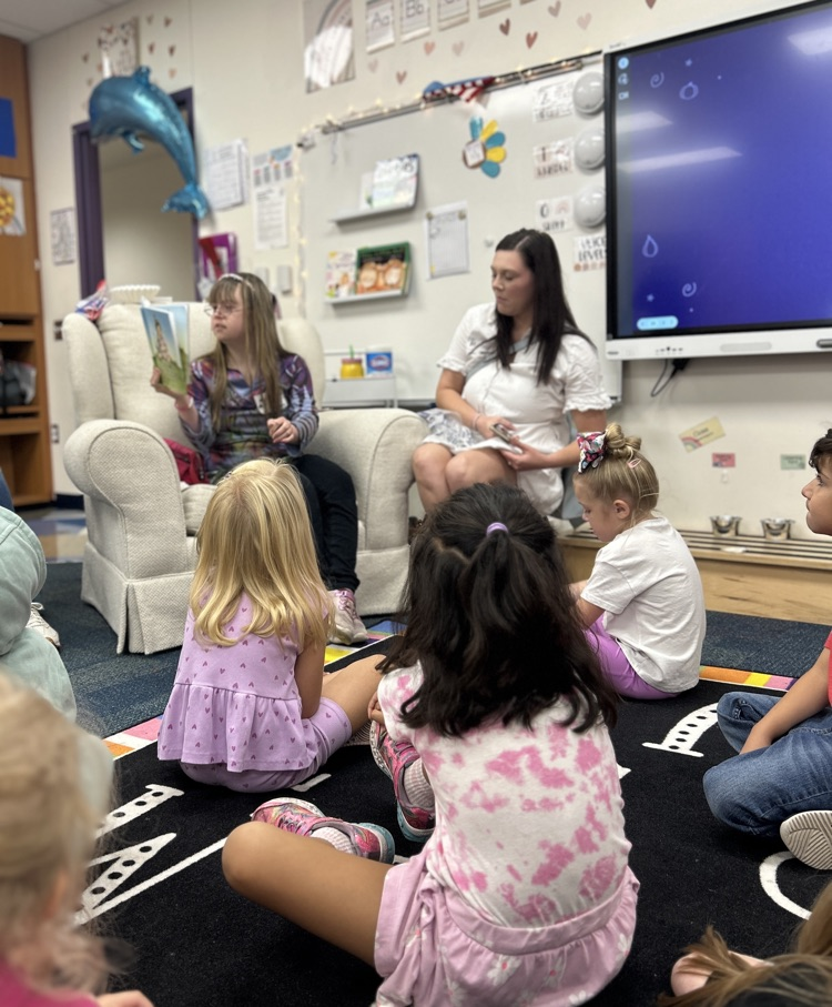 ms Hannah reading a book 