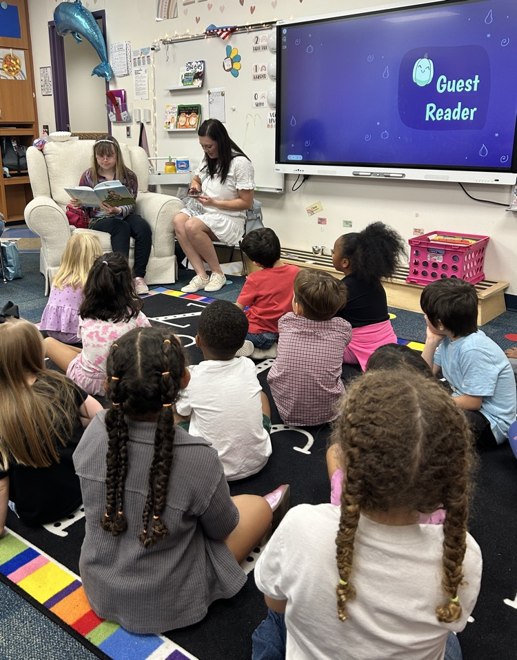ms Hannah reading a book 