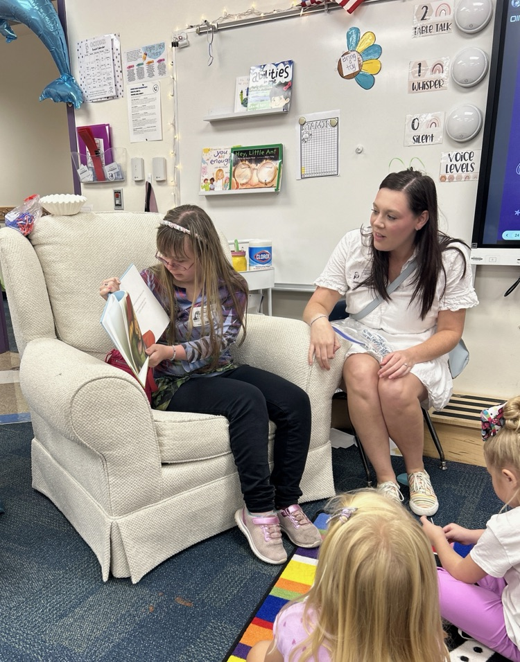 ms Hannah reading a book 