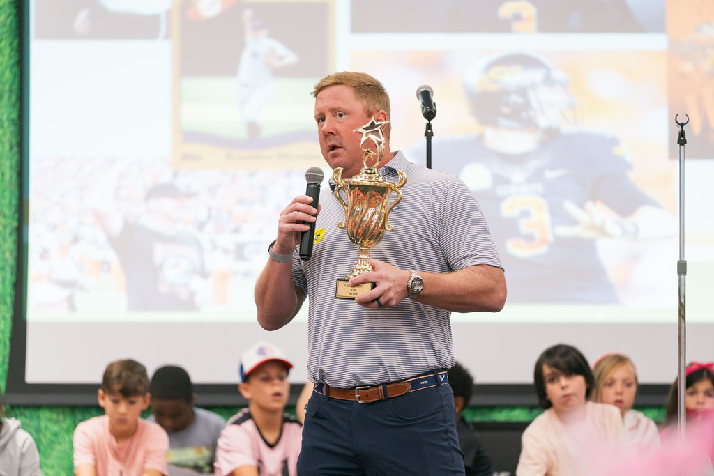 brandon weeden talking at an assembly